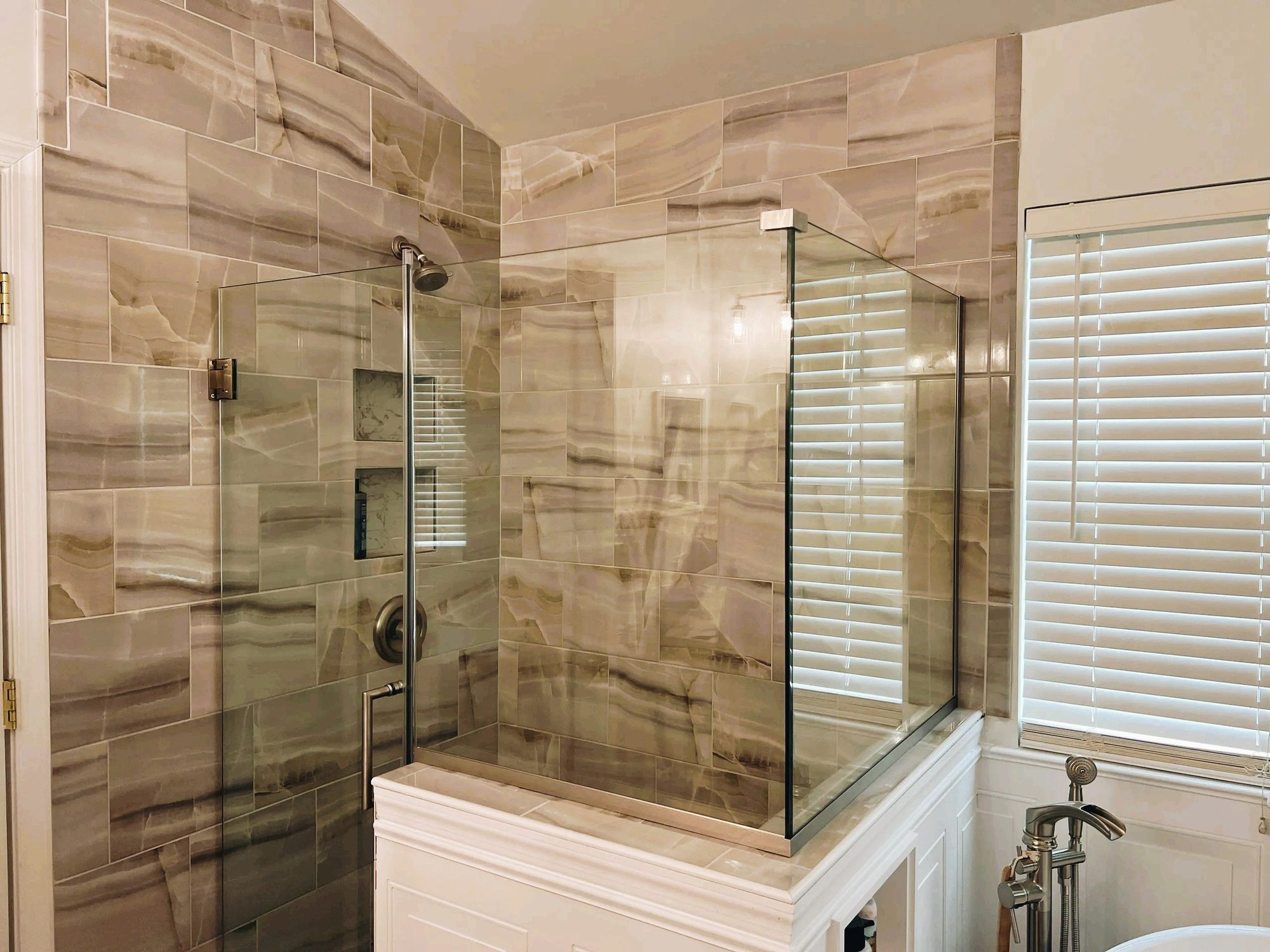 Walk-in tile shower with frameless glass, built by Matt's Maintenance and Makeovers